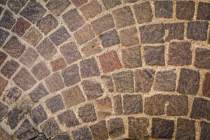 Rustic stone paving, top view, copy space